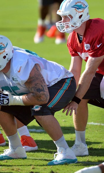 Offensive line makes strides in Dolphins scrimmage